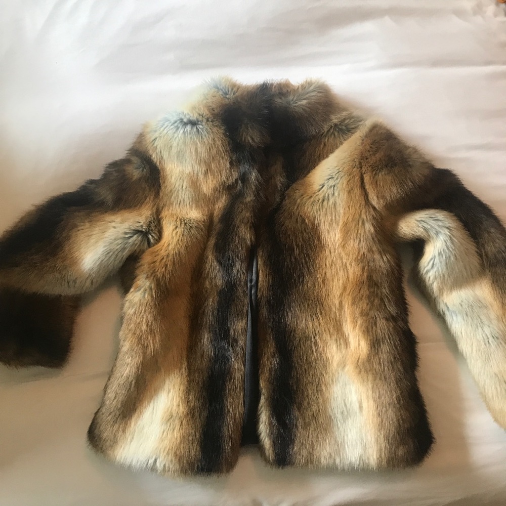 Fax fur hip length jacket.